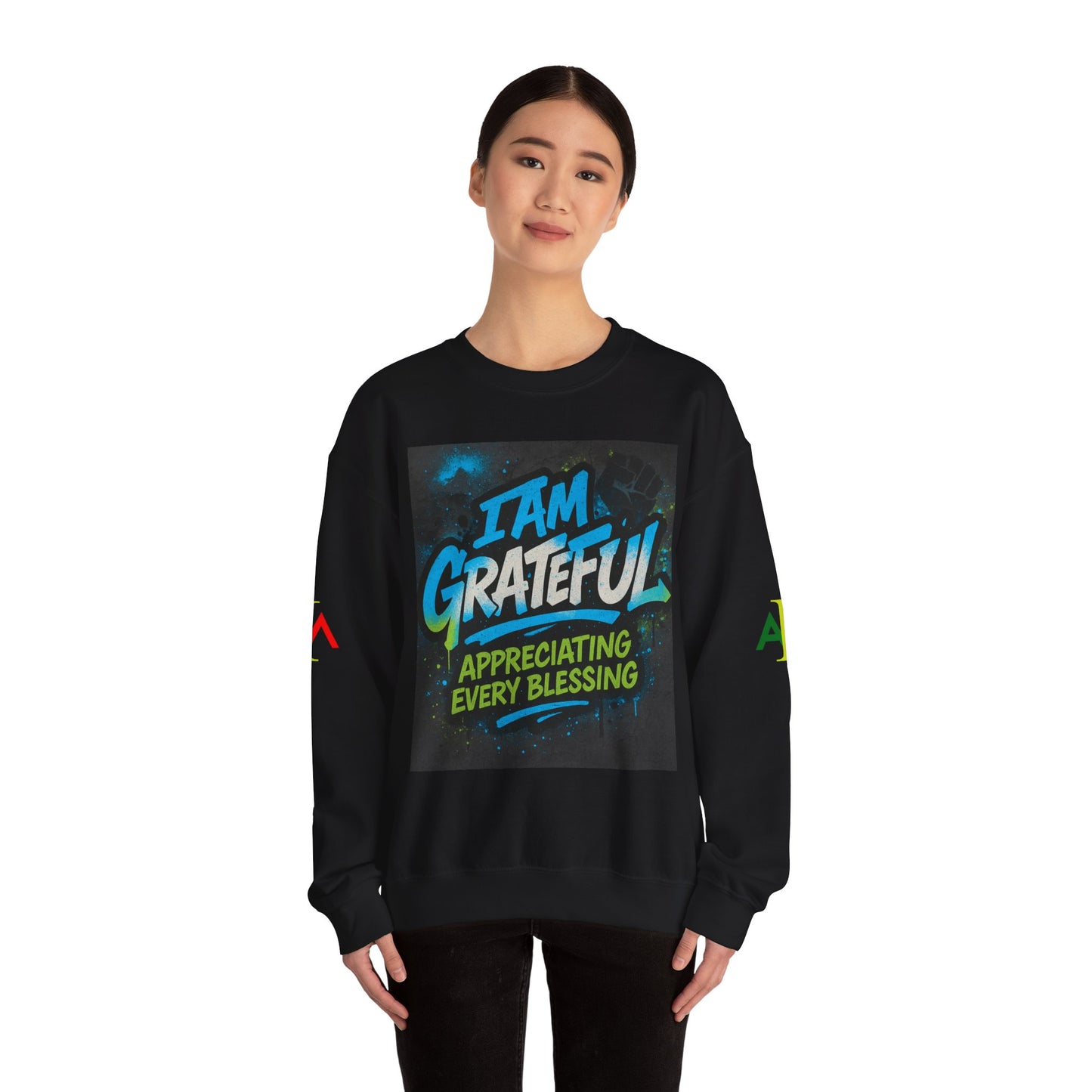 Person wearing a black sweatshirt with 'I AM GRATEFUL' text design on a white background