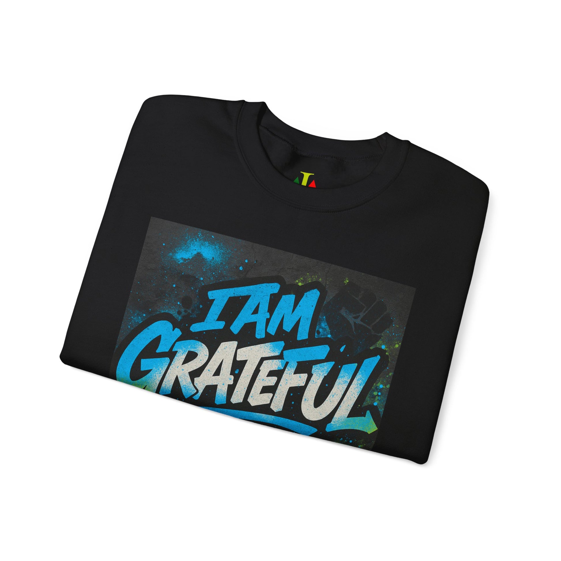 Black t-shirt with 'I AM GRATEFUL' text on a white background