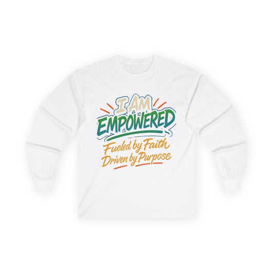 A white unisex long sleeve tee with a design that includes the text 'I AM EMPOWERED' in bold letters, along with the phrases 'Fuelled by Faith' and 'Driven by Purpose' in smaller and larger lettering respectively.