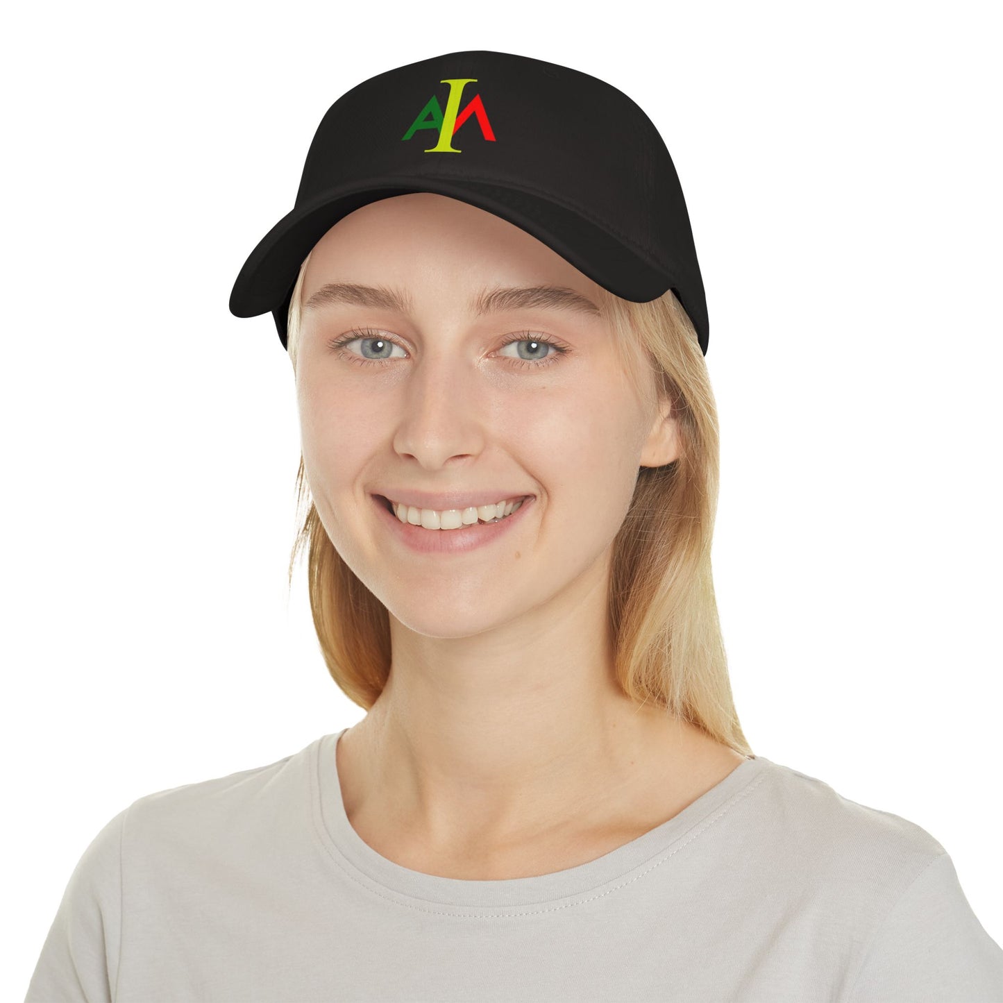 Person wearing a black cap with colorful logo on a white background