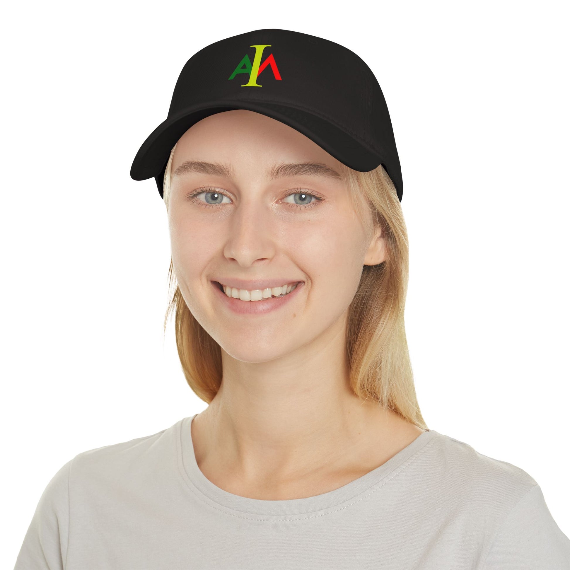 Person wearing a black cap with colorful logo on a white background