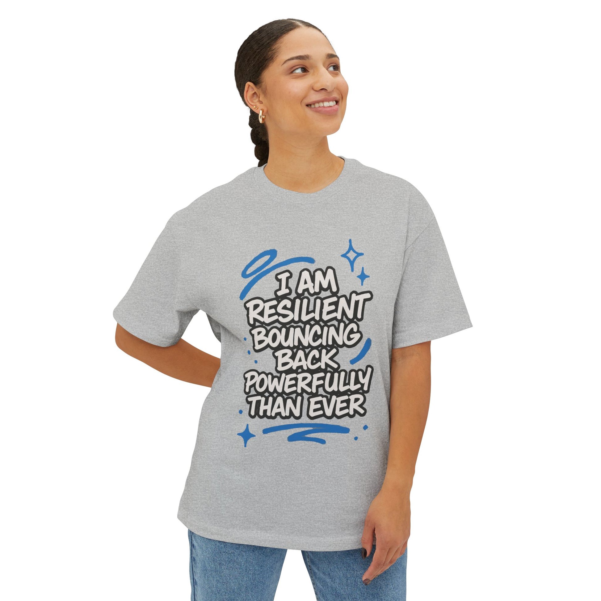 Person wearing a gray t-shirt with motivational text on a white background