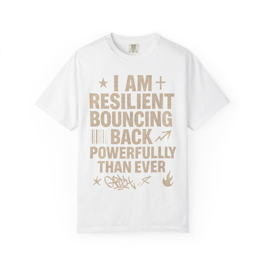 White crew neck t-shirt with the text 'I AM RESILIENT BOUNCING BACK POWERFULLY EVER' printed in gold.